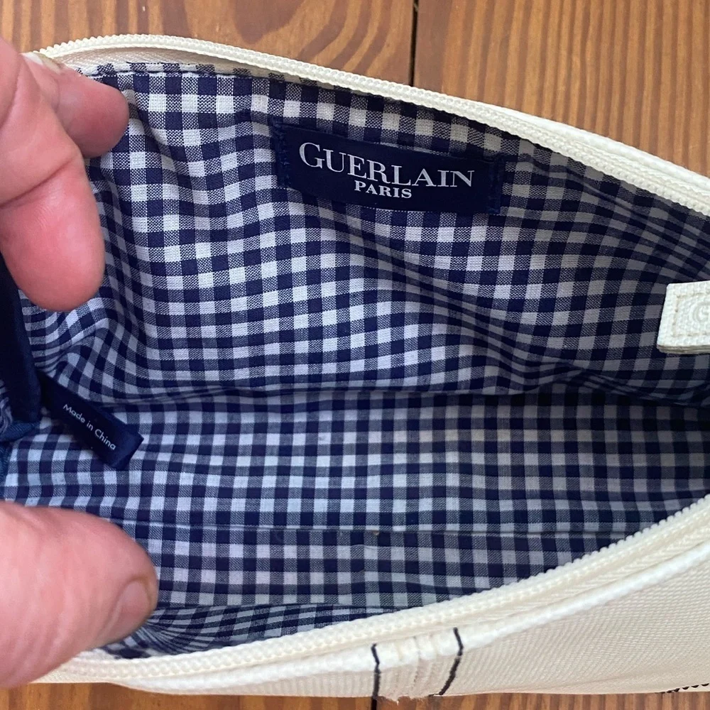 GUERLAIN Elegant Cream Cosmetic Bag with Blue Accents